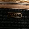Prada Medium Logo Embossed Handbag in Safiano Calf Leather